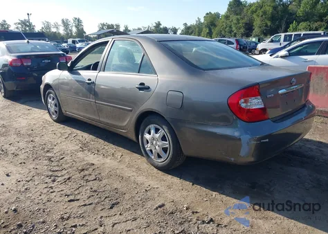 2004 Toyota Camry Le z USA, uszkodzony, nr VIN 4T1BE32K24U812615